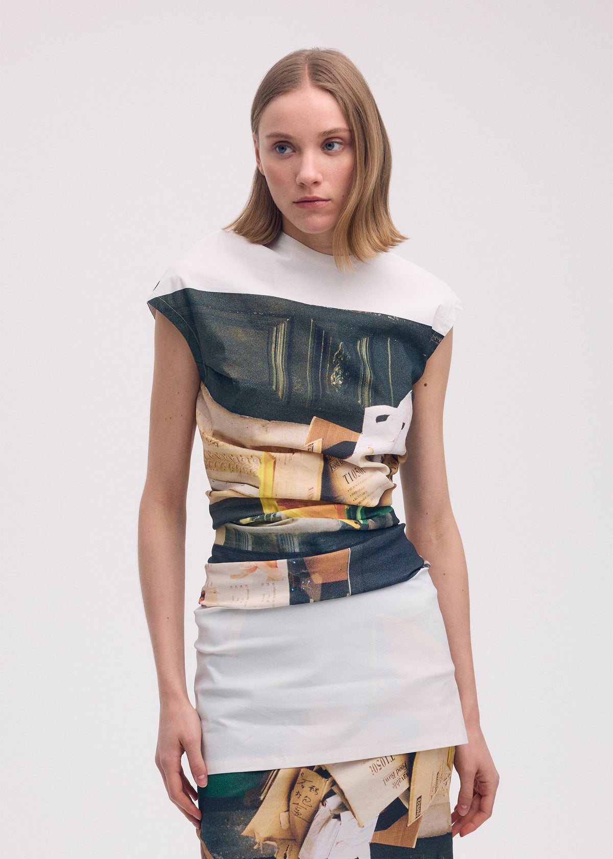 A model wears the Issey Miyake STREET VIEW dress.