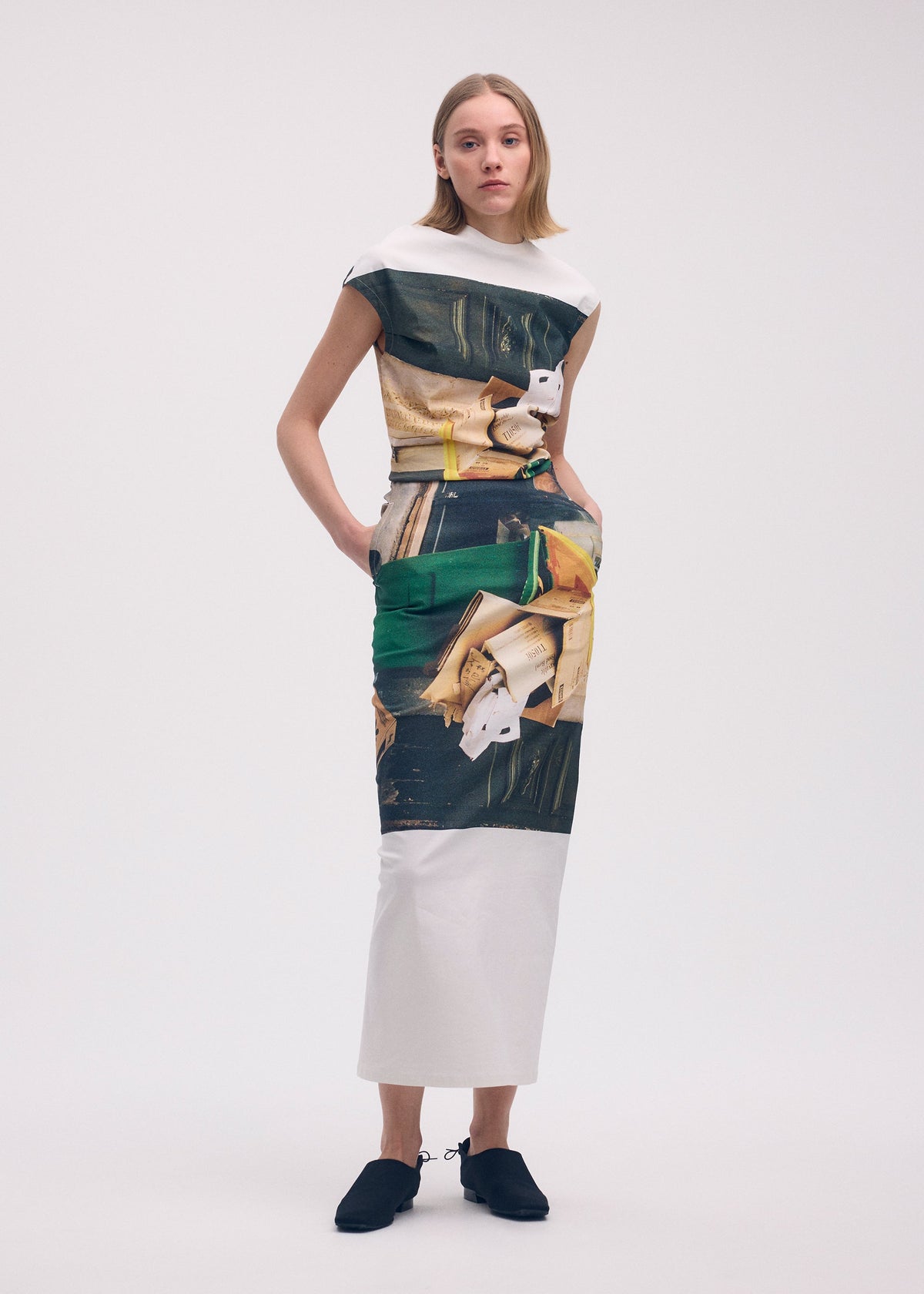 A model wears the Issey Miyake STREET VIEW dress.