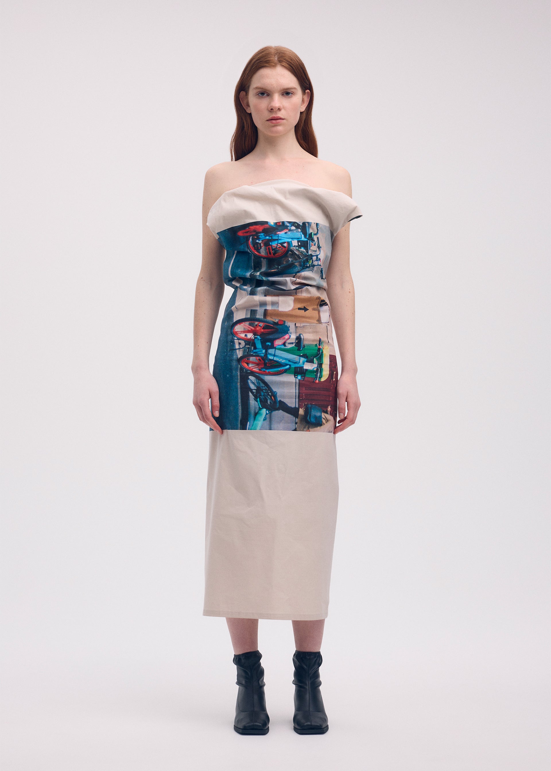 A model wears the Issey Miyake STREET VIEW dress.