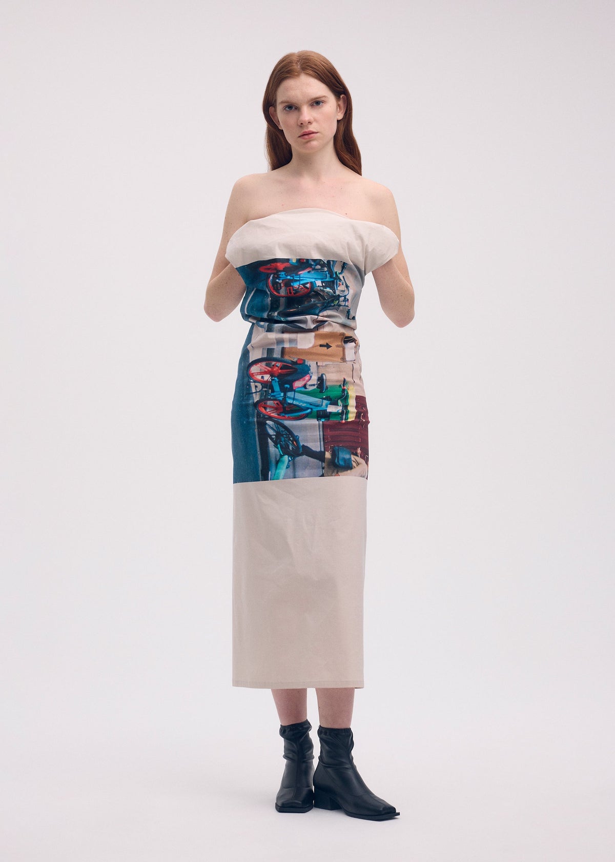 A model wears the Issey Miyake STREET VIEW dress.