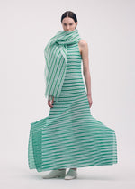 A model wears the Issey Miyake GENERIC STRIPES dress.