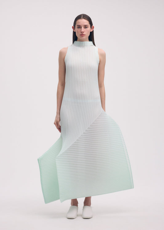 A model wears the ISSEY MIYAKE FOLD PLEATS dress.