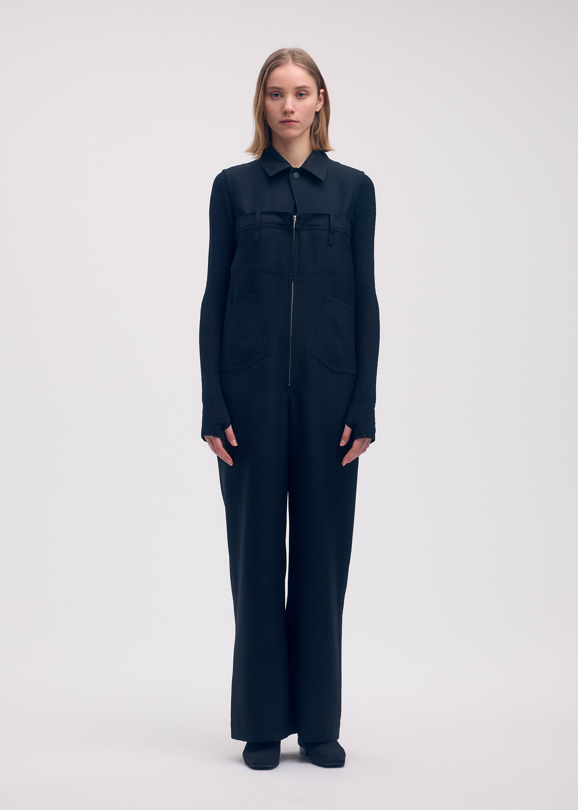 A model wears the Issey Miyake DISPOCKET Pants jumpsuit.