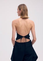 A model wears the Issey Miyake UNI FORM WOOL shirt.