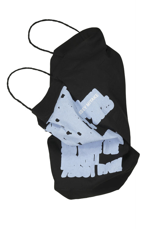 A product shot of the ISSEY MIYAKE PAPER BAG (POSTER) shirt in black-hued (17).