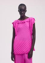 A model wears the ISSEY MIYAKE PAPER BAG PLEATS shirt.