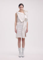 A model wears the Issey Miyake COLLAPSING SCULPTURE dress.