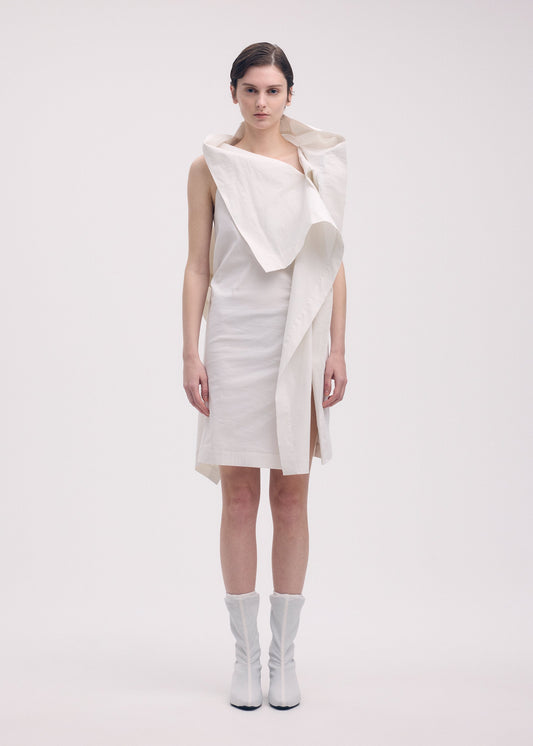 A model wears the Issey Miyake COLLAPSING SCULPTURE dress.