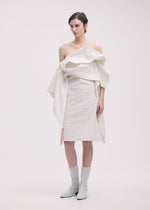 A model wears the Issey Miyake COLLAPSING SCULPTURE dress.