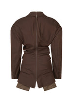 A detail shot of the Issey Miyake LIKE TORSO LIKE BLAZER dress.