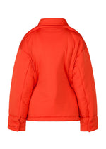 A detail shot of the ISSEY MIYAKE PUMPED T shirt.