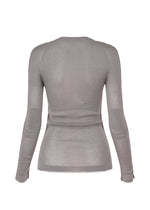 A detail shot of the Issey Miyake SEEN UNSEEN AP top.