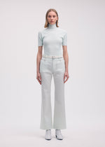 A model wears the Issey Miyake BODY KNIT top.