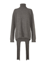 A product shot of the Issey Miyake BACKPACK KNIT top in .