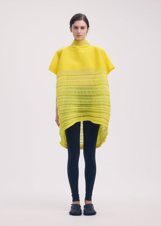 A model wears the Issey Miyake MOVING KNIT top.