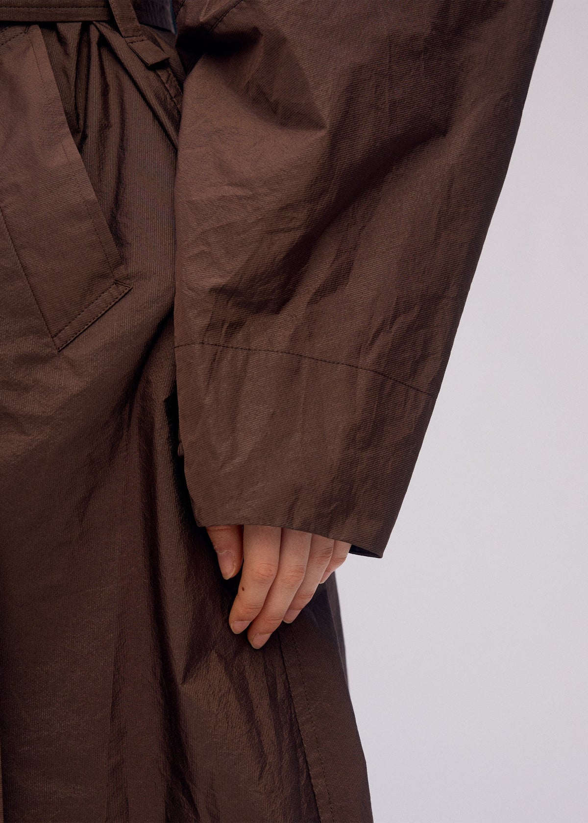 A model wears the ISSEY MIYAKE AKIMBO prêt à porter.