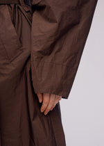 A model wears the ISSEY MIYAKE AKIMBO prêt à porter.