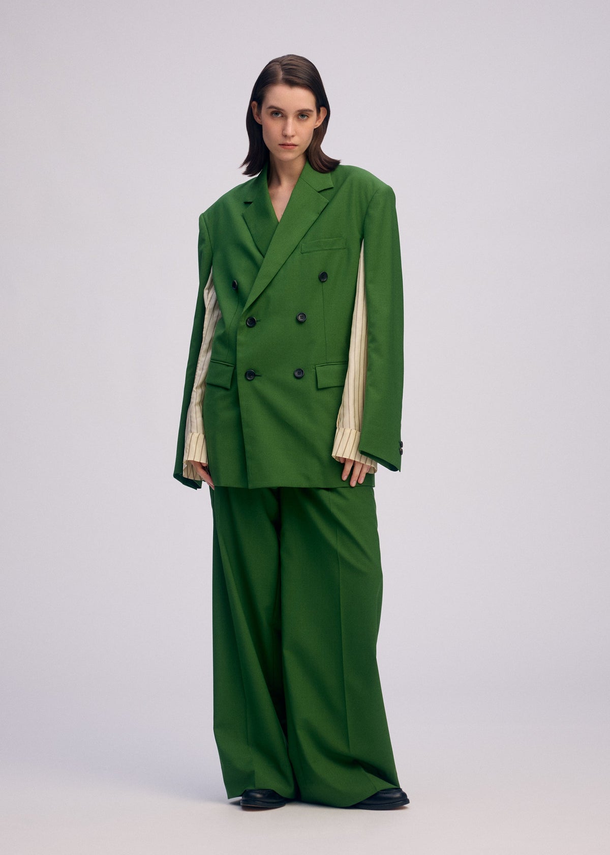 A model wears the ISSEY MIYAKE PALINDROME prêt à porter.