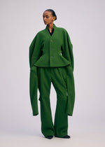 A model wears the ISSEY MIYAKE ARMS prêt à porter.