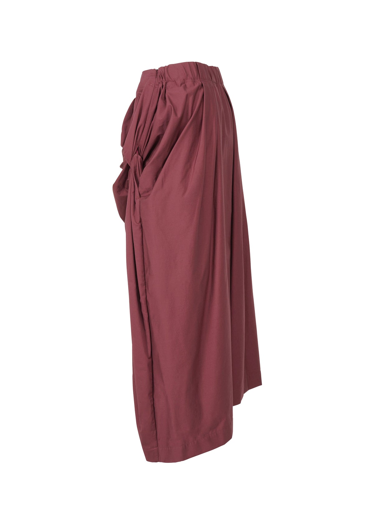 A detail shot of the ISSEY MIYAKE TWISTED DRAPE pants.