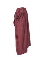 A detail shot of the ISSEY MIYAKE TWISTED DRAPE pants.
