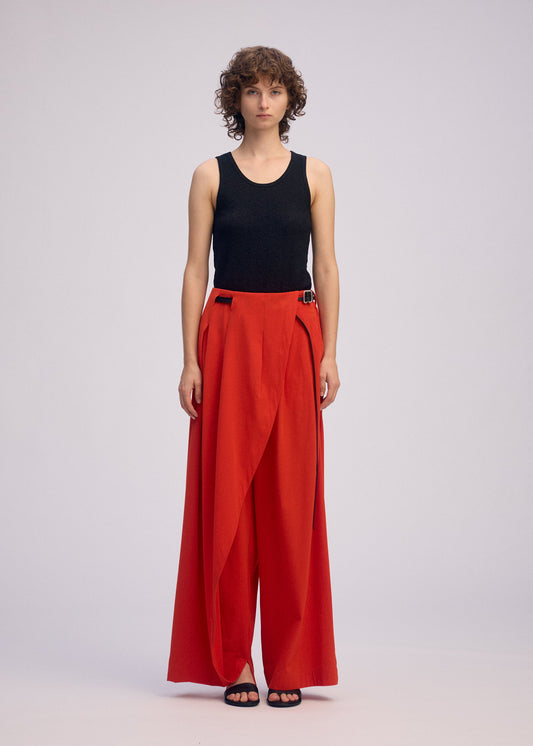 A model wears the Issey Miyake LOOPED pants.