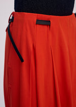 A model wears the Issey Miyake LOOPED pants.