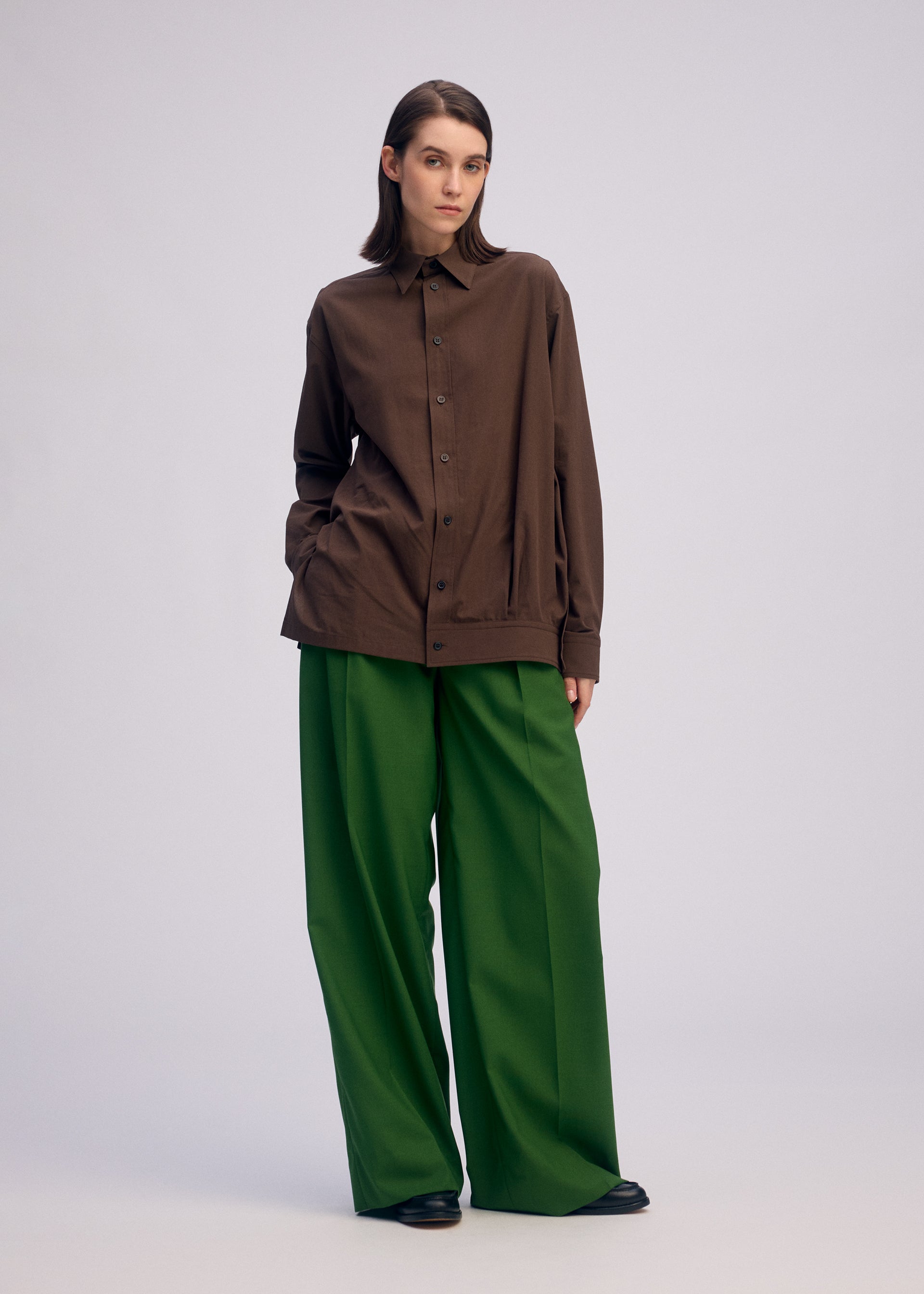 A model wears the ISSEY MIYAKE PALINDROME prêt à porter.