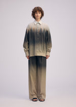 A model wears the ISSEY MIYAKE PLUMAGE plumage-pants-chukar.