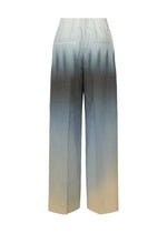 A detail shot of the ISSEY MIYAKE PLUMAGE trousers.