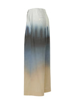 A detail shot of the ISSEY MIYAKE PLUMAGE trousers.