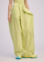 A model wears the ISSEY MIYAKE AKIMBO prêt à porter.