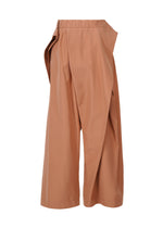A detail shot of the ISSEY MIYAKE FLUTTERING PANTS pants.
