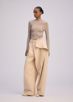 A model wears the ISSEY MIYAKE PRONOUNCED BODY prêt à porter.