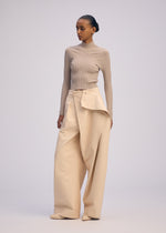 A model wears the ISSEY MIYAKE PRONOUNCED BODY prêt à porter.