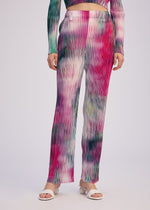 A model wears the ISSEY MIYAKE OBSCURE PLEATS prêt à porter.