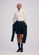 A model wears the ISSEY MIYAKE ARMS prêt à porter.