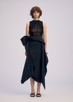 A model wears the ISSEY MIYAKE CONCEALED concealed-skirt-white.