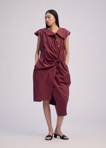 A model wears the ISSEY MIYAKE TWISTED DRAPE jumpsuit.