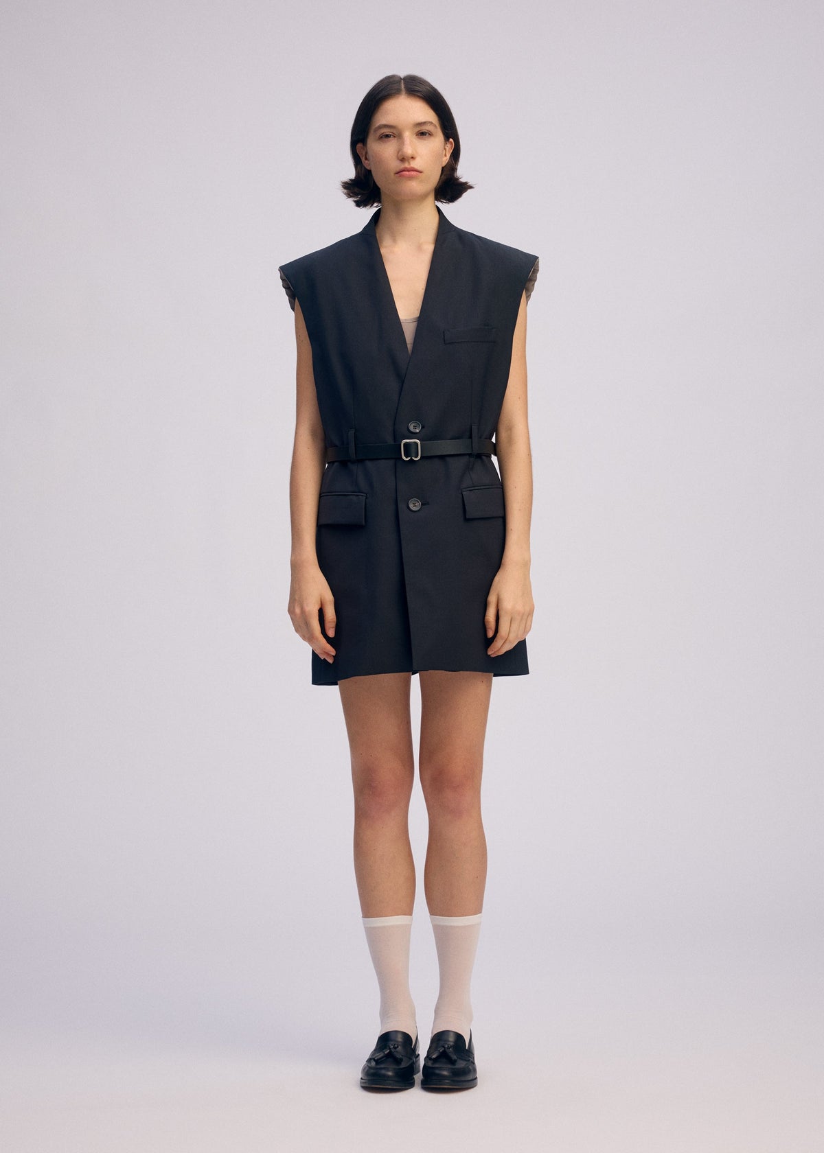 A model wears the ISSEY MIYAKE PALINDROME prêt à porter.