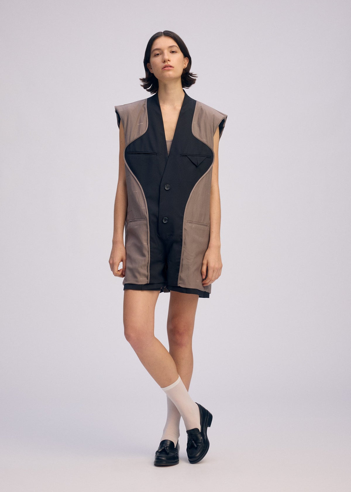 A model wears the ISSEY MIYAKE PALINDROME prêt à porter.
