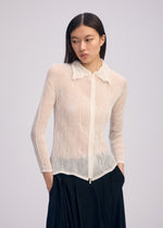 A model wears the Issey Miyake CHIFFON TWIST BKWT 66 shirt.