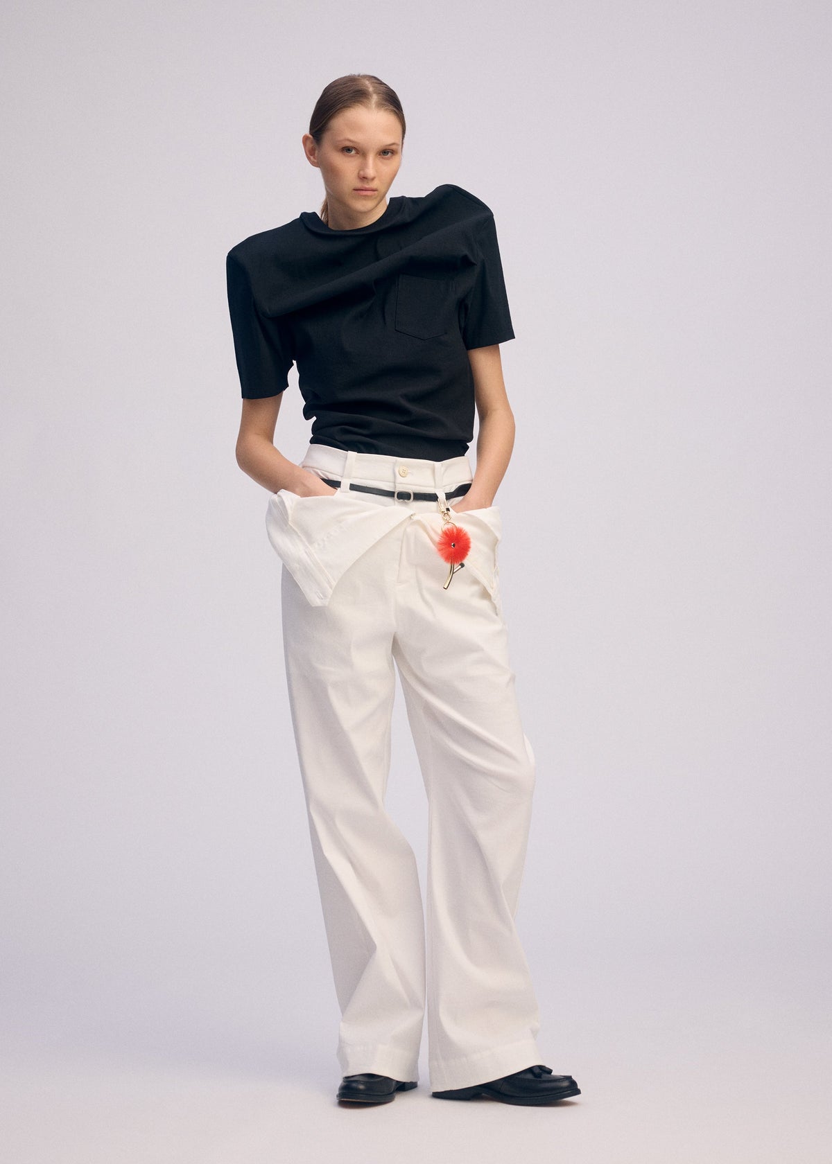 A model wears the Issey Miyake GENERIC WEAR prêt à porter.