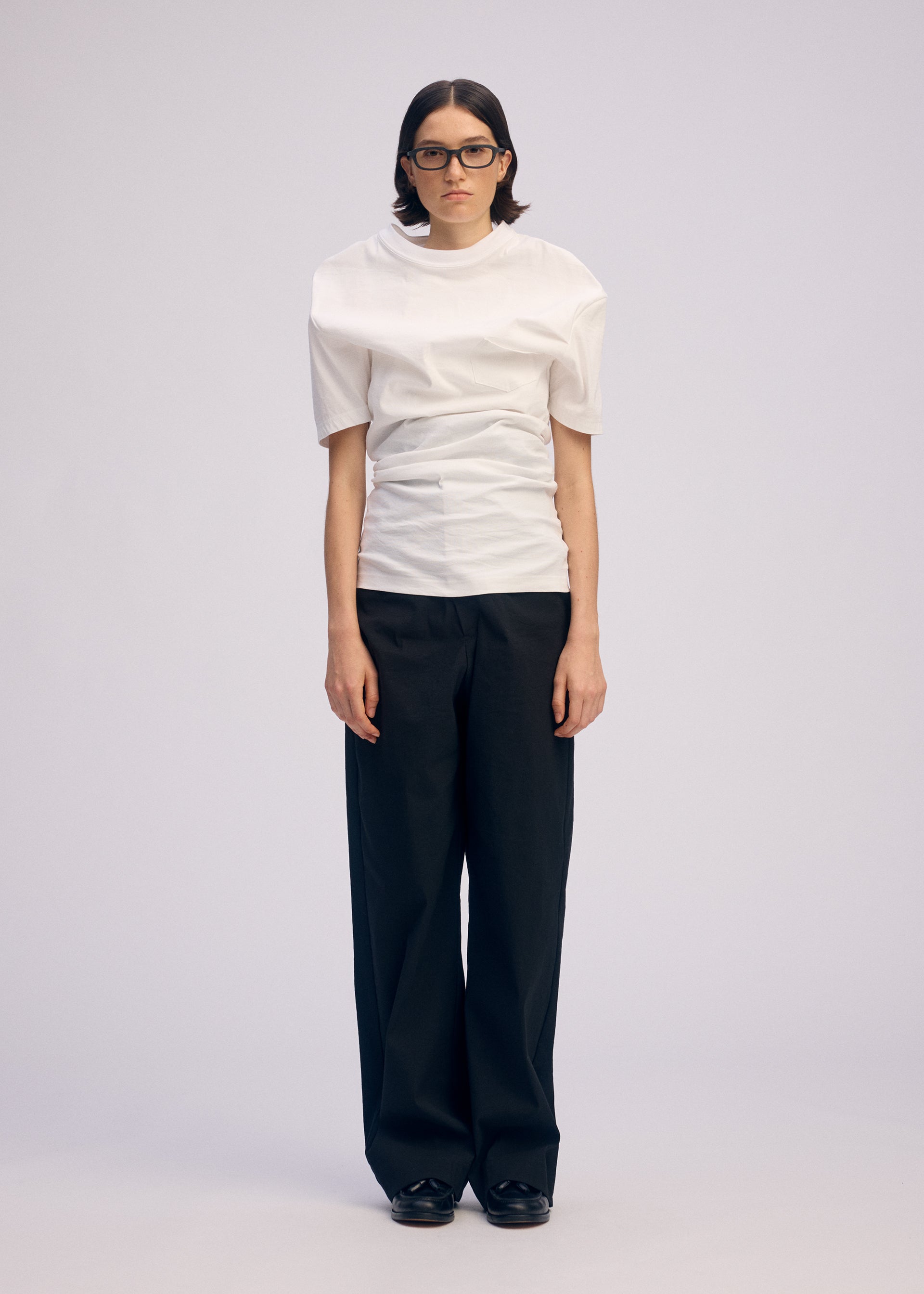 A model wears the Issey Miyake GENERIC WEAR prêt à porter.