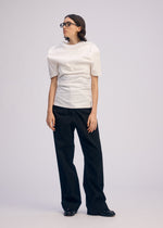 A model wears the Issey Miyake GENERIC WEAR prêt à porter.
