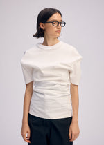 A model wears the Issey Miyake GENERIC WEAR prêt à porter.