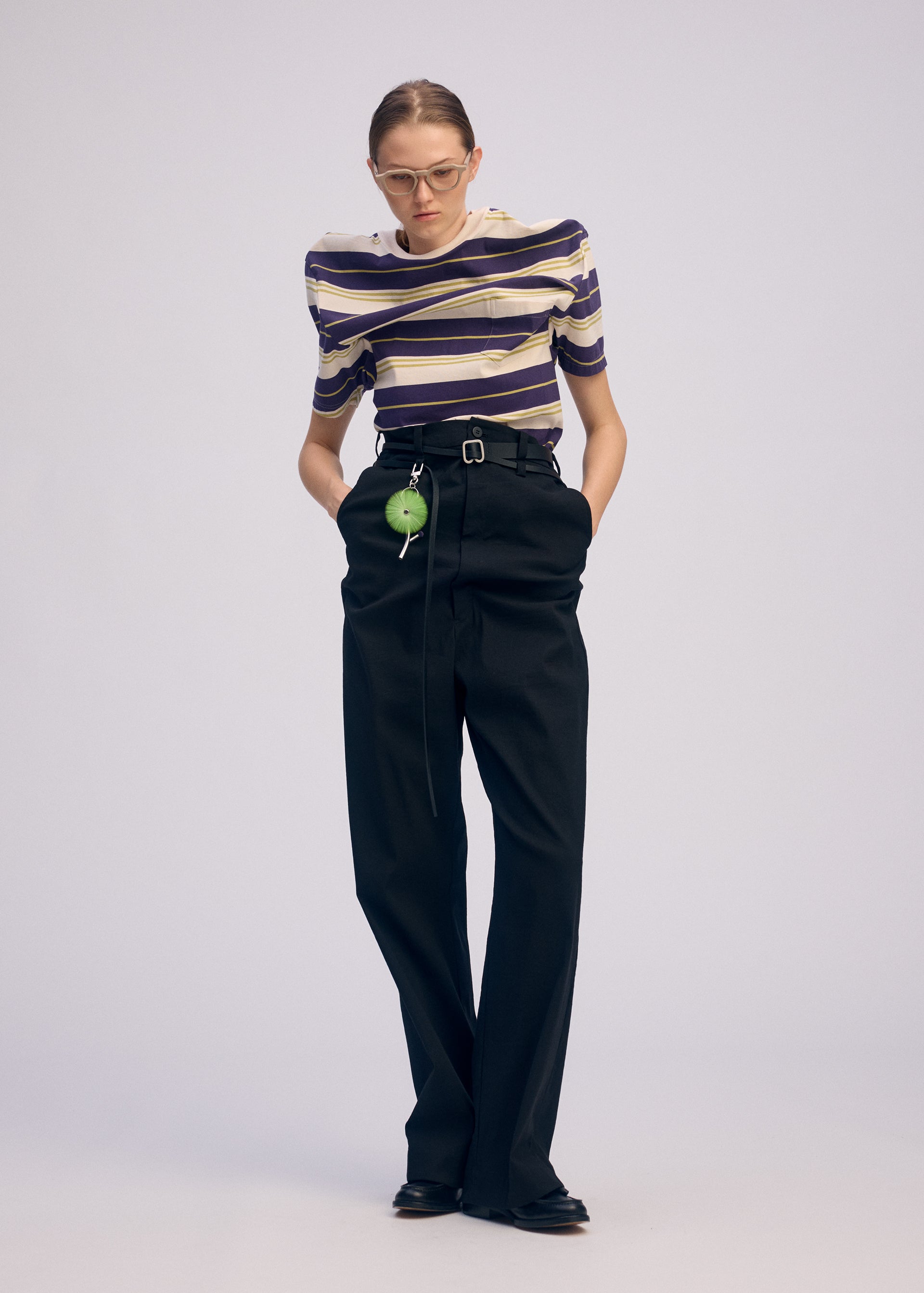 A model wears the Issey Miyake GENERIC WEAR?STRIPES prêt à porter.