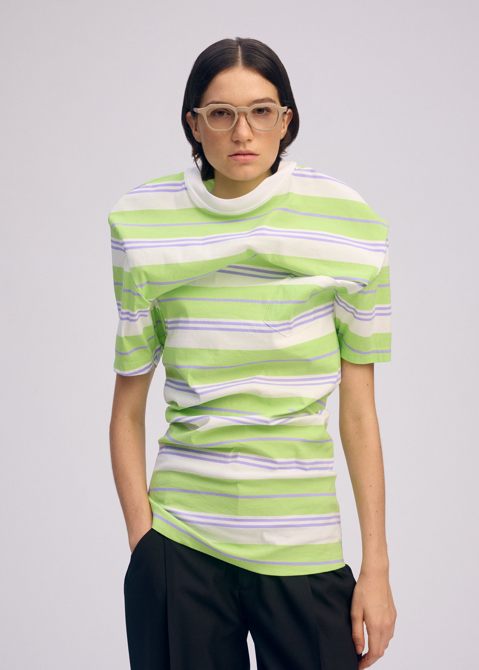 A model wears the Issey Miyake GENERIC WEAR?STRIPES prêt à porter.