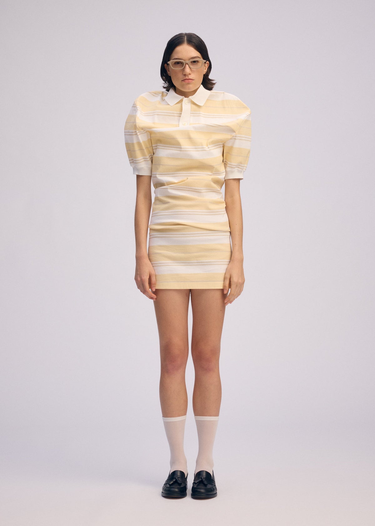 A model wears the Issey Miyake GENERIC WEAR?STRIPES prêt à porter.