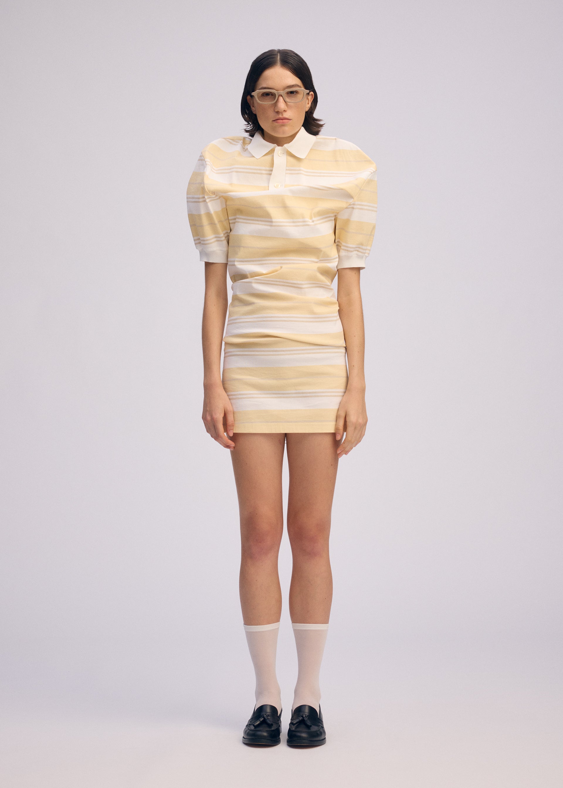 A model wears the Issey Miyake GENERIC WEAR?STRIPES prêt à porter.